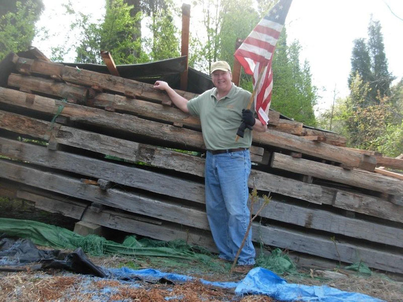 Kentucky Flag Waving. Relocating an Authentic Log