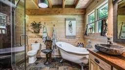 A Rustic Log Home Bathroom, Built for Relaxation