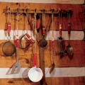 Tools hanging on a handcrafted log wall