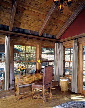 log home office with windows