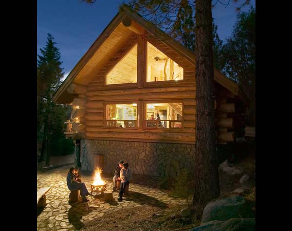 log cabin at night
