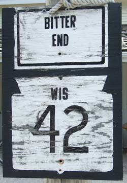 Bitter End Wooden Road Sign | Post Outside of Nelsen's Hall