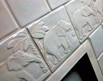Carved White Tile with Elephants Marching