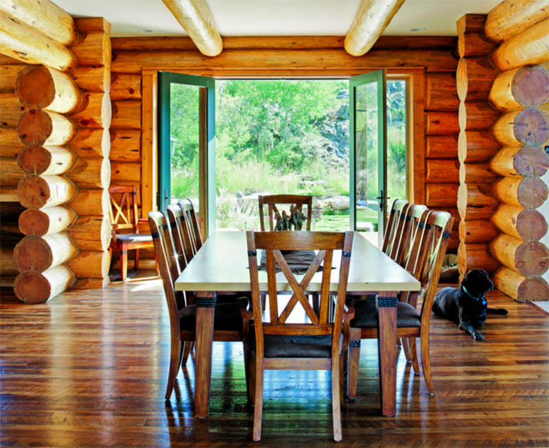 log home dining room open doors