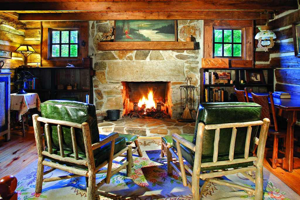 log cabin living room stone fireplace