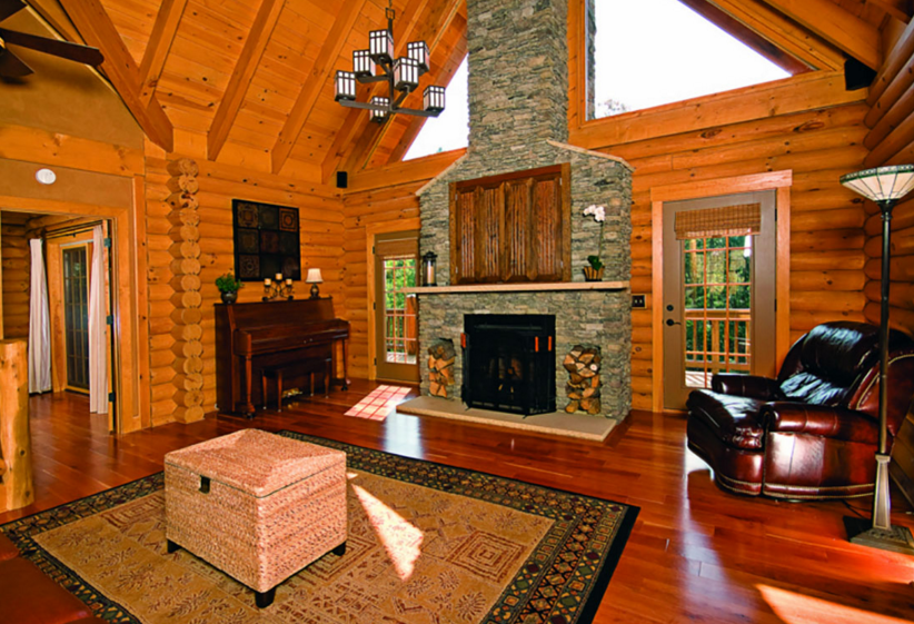 log home great room stone fireplace