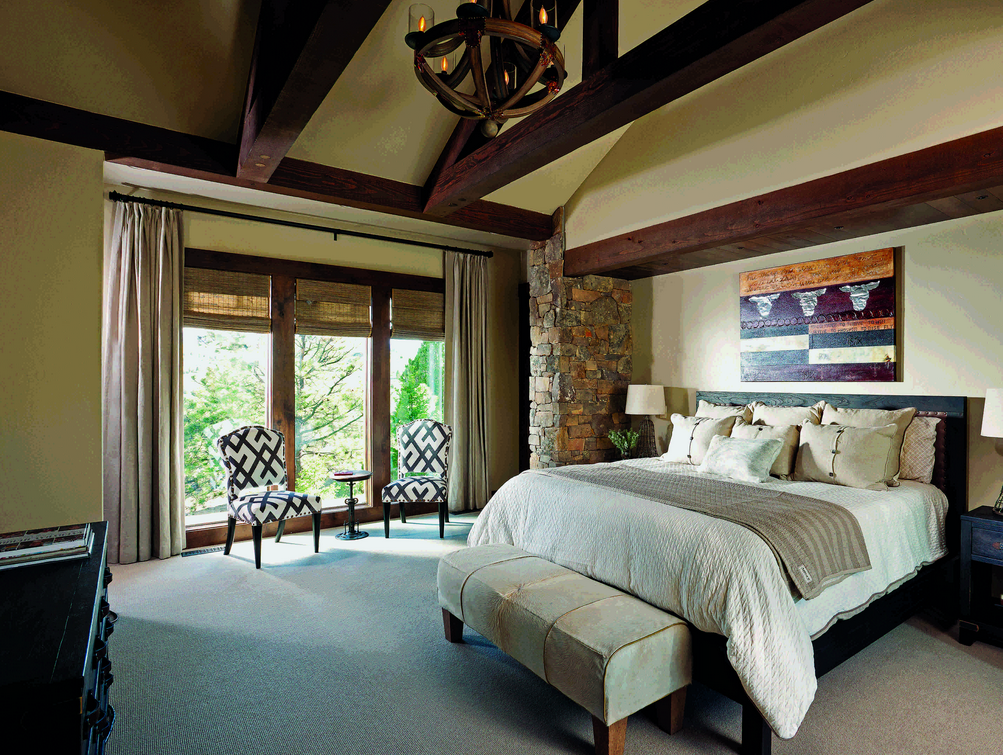 timber home bedroom wood beams cream bed