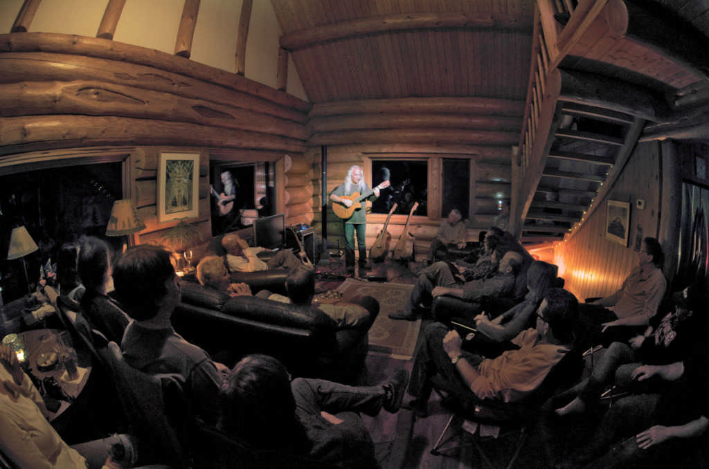 musicians in log home