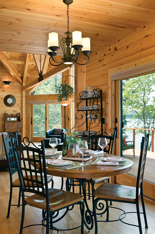 lakeside log home dining area