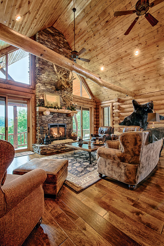 Great-Room-Unique-Wood-Flooring-Fireplace-Flat-Feature-Wall-Interior-Dowell-(Golden-Eagle-Log-Homes)-4